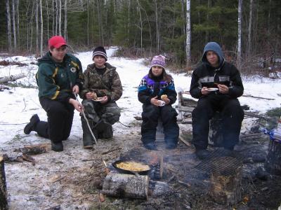 The Get Outdoors Club was having lunch over campfires.